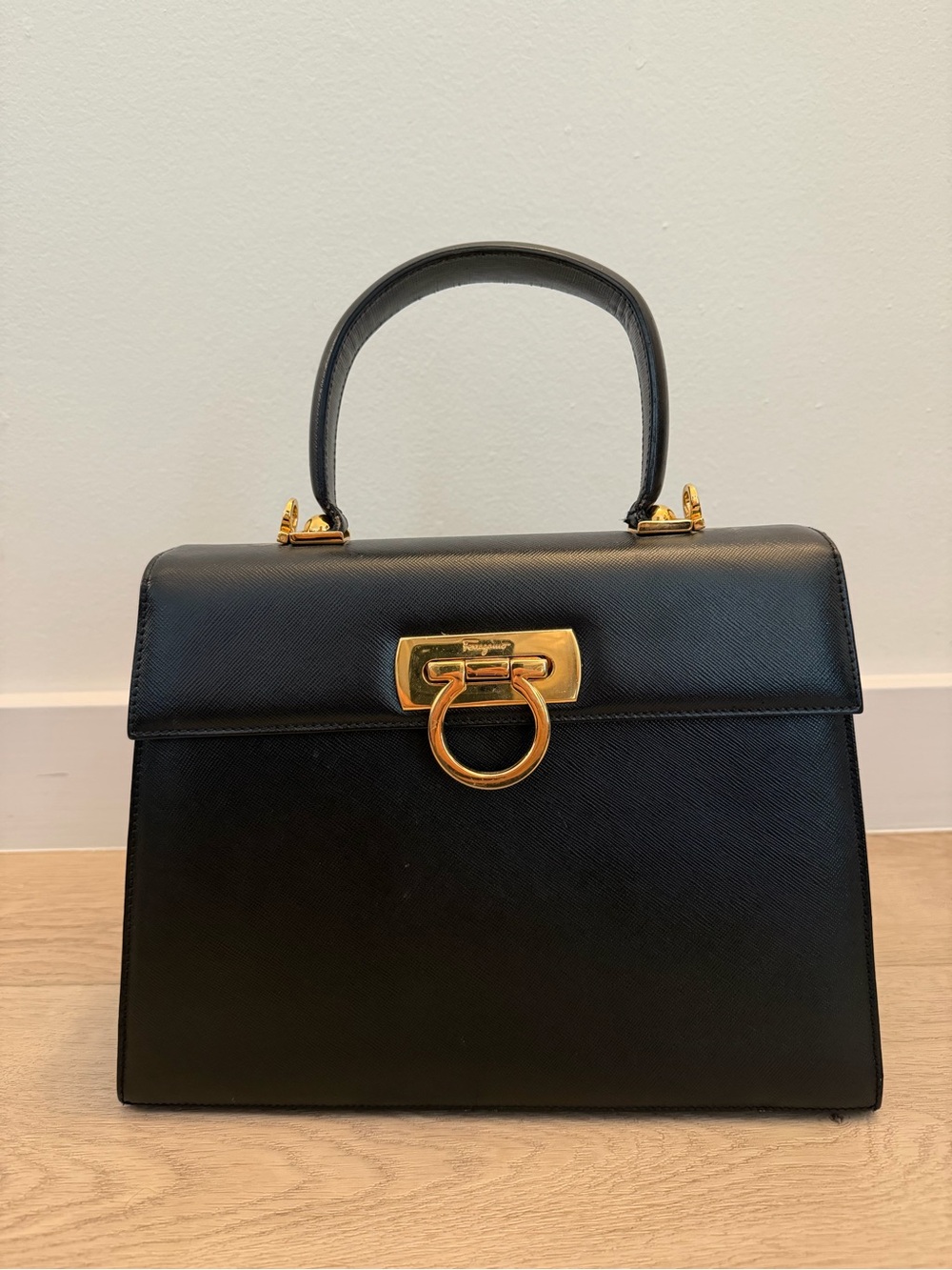 Vintage Salvatore Ferragamo Black Top-Handle Bag with Gold Gancini Closure